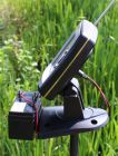 Upgraded receiver showing battery attachment using locking pads.