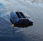 The eesi-klik bracket mounted at the rear corner of the boat